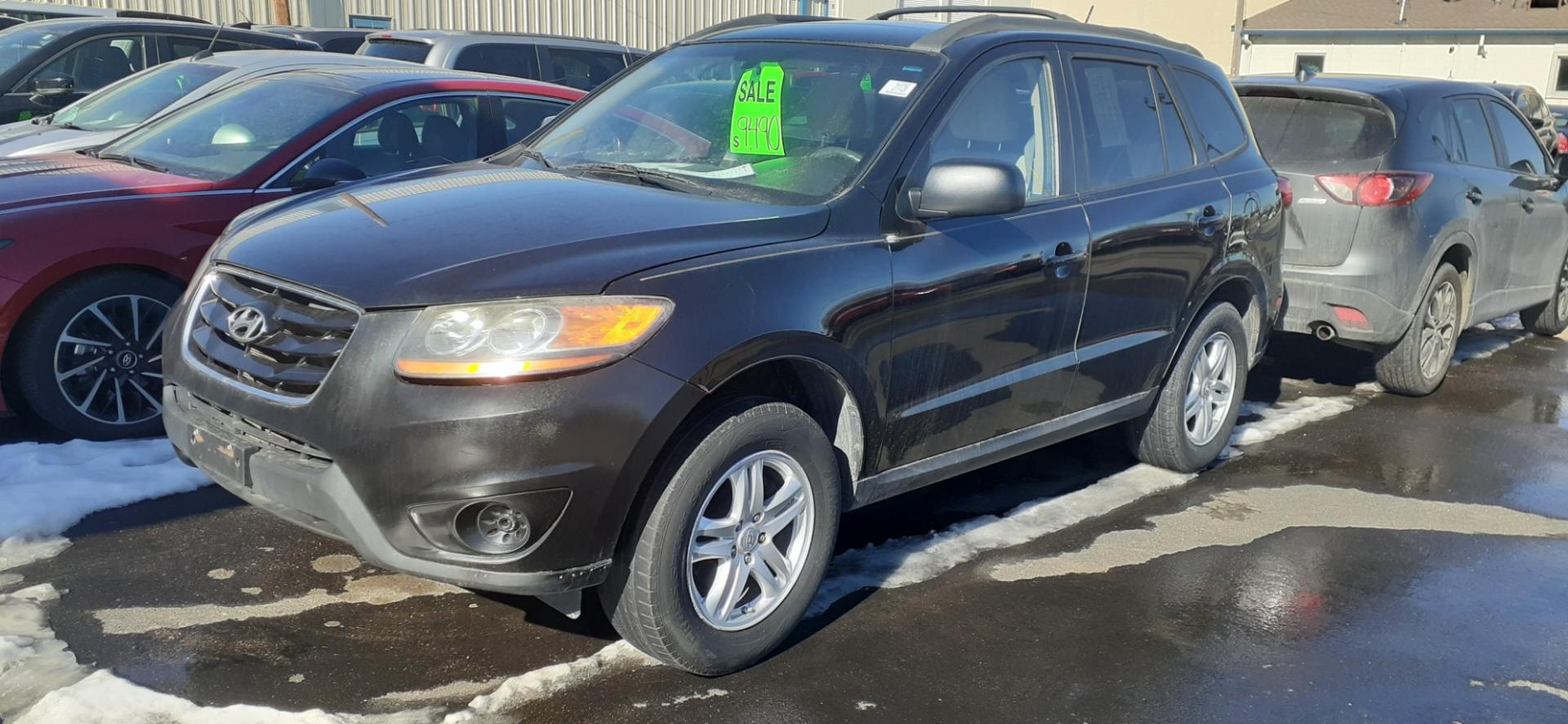 2010 Hyundai Santa Fe GL 4WD (5NMSGDAB9AH) with an 2.4L L4 DOHC 16V engine, located at 2015 Cambell Street, Rapid City, SD, 57701, (605) 342-8326, 44.066433, -103.191772 - CARFAX AVAILABLE - Photo#1